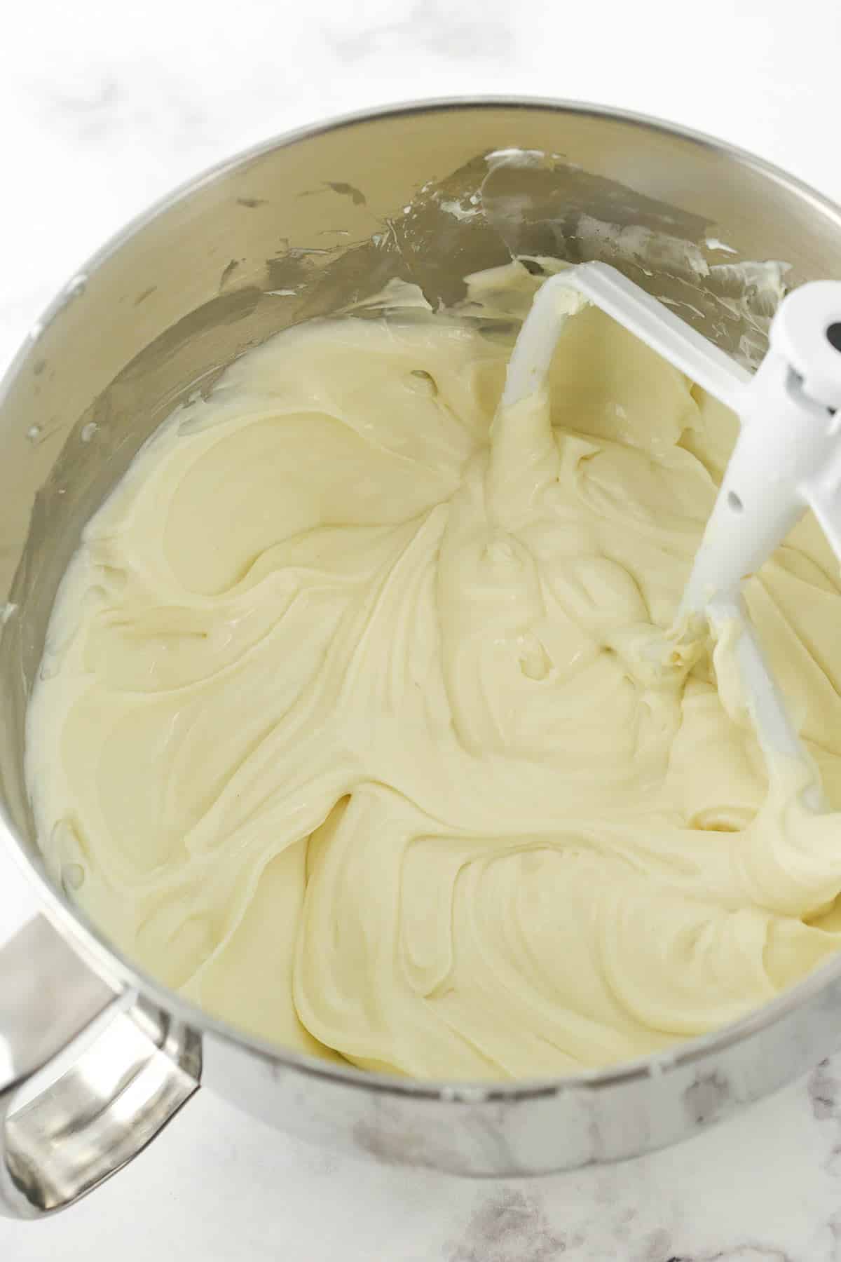 Stand mixer bowl and paddle with cream cheese filling