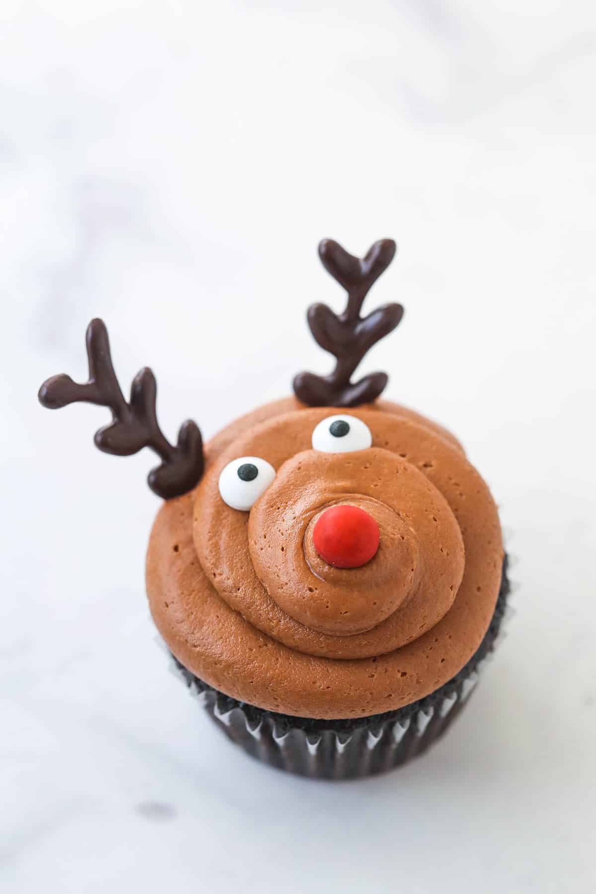 finished reindeer cupcake on marble background