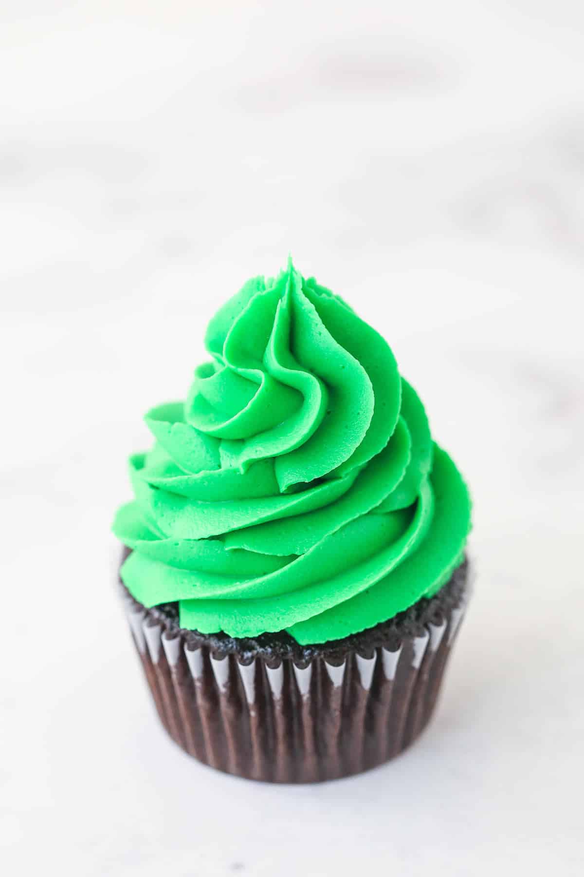 a fully piped christmas tree cupcake