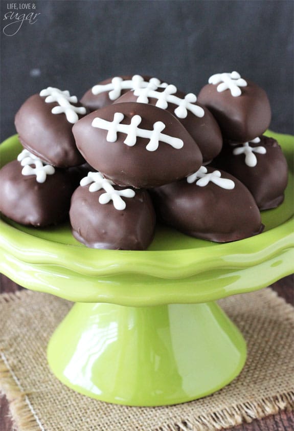 Eggless Cookie Dough Footballs on a green cake stand