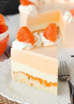A slice of Orange Creamsicle Ice Cream Cake on a plate