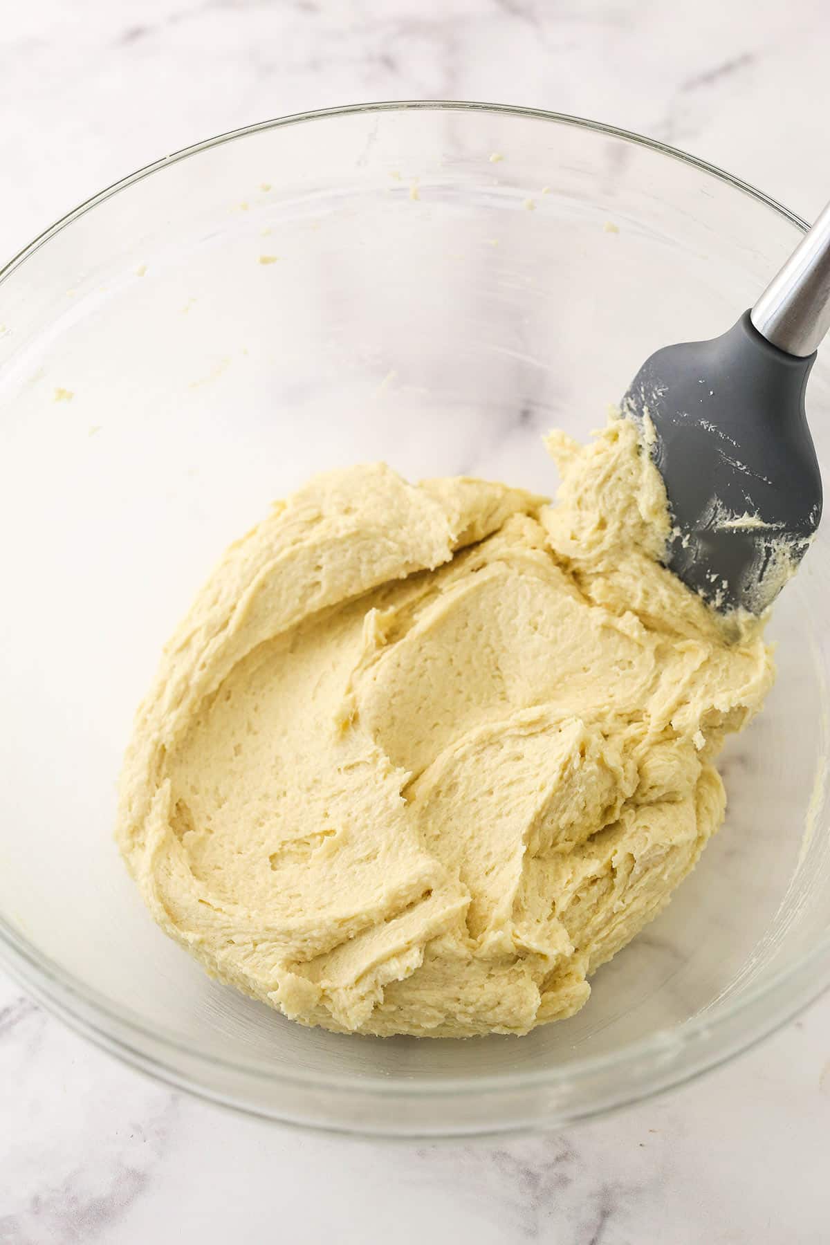 Creamed butter with egg and vanilla extract.