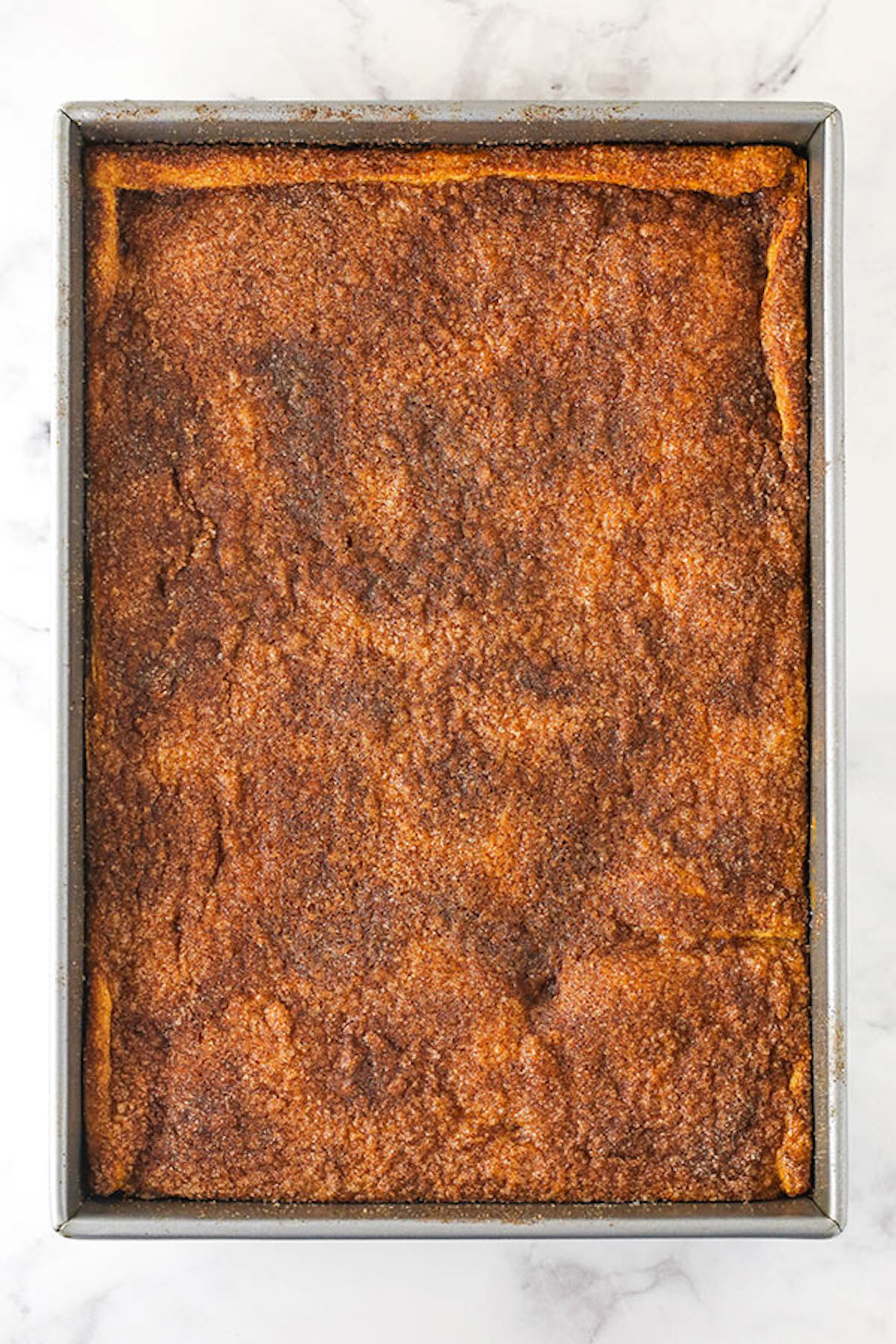 A Bird's Eye View of a Pan of Sopapilla Cheesecake Bars