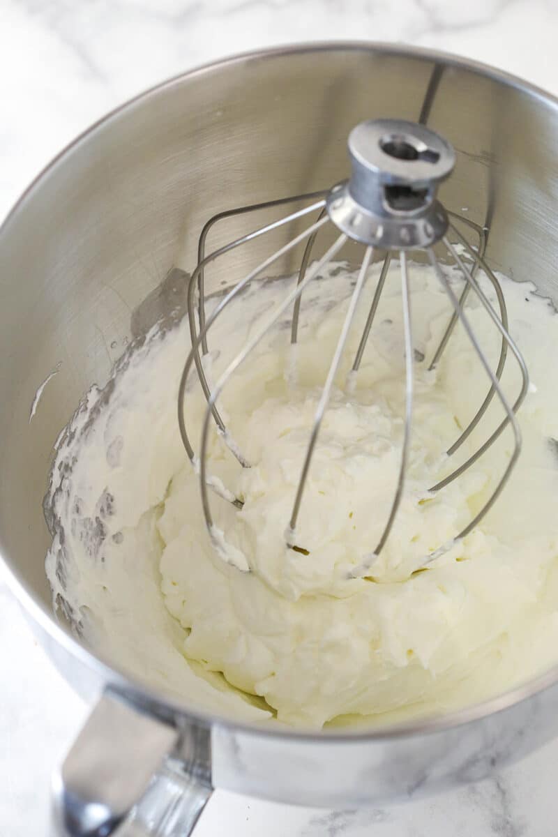 Making whipped cream for no-bake cheesecake filling.