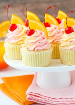 Tequila Sunrise Cupcakes on cake stand